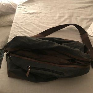 blue canvas overnight duffle bag